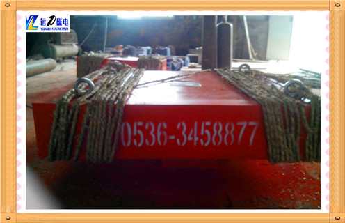 除鐵器，懸掛式除鐵器，懸掛式除鐵器物料中的鐵磁雜物吸附